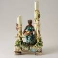 German majolica glazed ceramic figure of woman with fruit basket and bamboo stamped 14  x 7 x 5