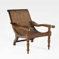 British colonial plantation chair mahogany frame with cane seat and foot rests 19th c 36 x 27 12 x 48