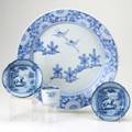 Japanese porcelain four pieces blue and white 19th20th c larger charger pair of rice bowls drinking vessel unmarked largest 18 dia