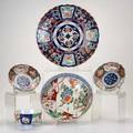 Imari five pieces 19th20th c rice bowl two shallow soup bowls large serving bowl and charger unmarked largest 12