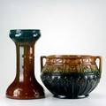 Majolica jardiniere and pedestal in green and brown glaze with repeating floral and geometric motif 29 x 17 dia