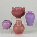 Rookwood four production vases two with plum glaze 19191920 and two in purple glaze 19281930 all marked tallest 5 12
