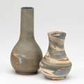 Niloak two missionware vases both with impressed mark and one with paper label larger 8 34