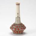 Mettlach bud vase with brown and green stylized decoration marked 9 12 x 5