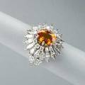 Orange sapphire diamond platinum ring circular floriform cluster design centers an oval faceted deep orange sapphire approx 235 cts among circular and marquise cut diamonds approx 2 cts tw 8