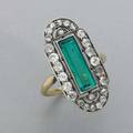 Emerald diamond ring 19101920 fine and translucent baguette cut emerald 16mm x 5mm oec and omc diamonds approx 130 cts tw in pierced and milgrain panel platinumtopped gold chased edge go