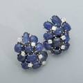 Sapphire and diamond ear clips ca 1960 prong set oec and transitional cut diamonds approx 2 cts tw among blue sapphire cabochon pebbles 14k wg in the style of seaman shepps unmarked 159