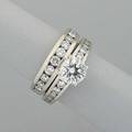 121 cts diamond in wedding ring set round brilliant hsi very good cut polish and symmetry none fluorescent in 14k wg and diamond channels companion halfhoop band 150 cts tw melee 57 d