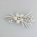 Diamond 18k wg bouquet brooch ca 1955 prong set and bead set circular cut diamonds approx 170 cts tw marked bb possibly briggs bates and bacon co 106 dwt 164 gs 2 34