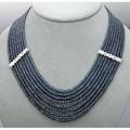 Art deco style blue sapphire bead and diamond necklace ca 2000 eight concentric rows of faceted blue sapphire beads join diamond and 18k wg openwork spacers to form a supple ribbon matching clasp