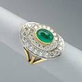 Diamond and emerald 14k ring oval concentric diamond rows in white gold approx 75 ct tw and oval emerald cabochon set in yellow gold yellow gold band 45 dwt 70 gs size 4
