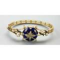 Victorian revival enameled gold bracelet watch ca 1960 14k yg triple wire hinged bangle with pearls and blue enamel center hinged to reveal watch 17 jewel swiss movement by paul buhre 162 dwt