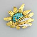 Tiffany  co french wasp on flower brooch ca 1963 realistically rendered in life size wasp with diamond wings alights on the turquoise center of a daisy blossom 18k doublepin hinged clasp mark