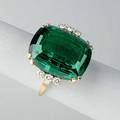 Tiffany  co tourmaline and diamond ring 20th century cushion cut bluegreen tourmaline approx 925 cts 6 diamonds 30 ct tw in 14k yg 63 dwt 98 gs size 7