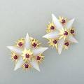 Jean schlumberger for tiffany  co star earrings ca 1958 18k yg with carved white chalcedony stars and ruby cabochon accents clip backs for unpierced ears marked tiffany  co schlumberger fr