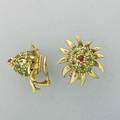 Jean schlumberger for tiffany  co gemset gold thistle earrings circular cut peridot thistle with cabochon ruby tip in 18k yg clip backs for unpierced ears marked 874 dwt 136 gs 1