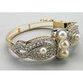 Diamond and pearl hinged gold bracelet ca 1955 14k wg and yg in the victorian style with single cut diamonds approx 22 cts and five postset akoya pearls 7259mm 195 dwt 298 gs 1