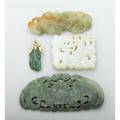 Chinese carved jade and nephrite jewelry white jade square pierced panel depicts dragon carp on gold brooch mount bat pendant mango and gold foliage pendant largest 4