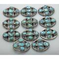 Navajo tufa cast silver and turquoise conchas and buckle first half 20th century ten oval and cruciform conchas and buckle with five bright turquoise cabochons copper straps for 1 58 belt missin