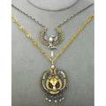 Egyptian revival jewelry 19001920 two pieces silver pliqueajour winged serpent necklace with blister and dentil pearl attrib meyle  mayer 1 12 x 1 38 gold cleopatra necklacebrooch with