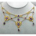 Tiffany  co gold and amethyst festoon necklace by dreher  son ca 1910 in the renaissance style with circular and oval amethysts in scroll chevrons and pearshaped drops in leather box marked ti