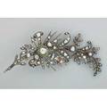 Trophyofarms diamond corsage ornament ca 1800 silver and gold with foilbacked rose cut diamonds designed as crossed torch arrow and club above flowering brach with ribbons enameled accents la