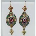 Rare pair of holbeinesque enameled gold earrings ca 1870 shepherds hook wire and enameled surmount suspends oval enameled drops with carbuncle and square cut chrysoberyls square chrysoberyl clust
