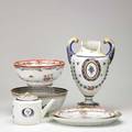 Chinese export grouping six items early 19th c double handled urn two large bowls two platters and a teapot all with damage tallest 15 14
