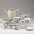 Chinese export ten items late 18thearly 19th c covered rice bowl and four cups with various armorial crests two teapots with banding and sepia rose decoration and three sauceboats with famille r