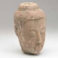 Thai style carved head pink sandstone 20th c 13 x 7 x 8