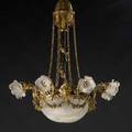 Dore bronze and glass chandelier eightarm with foliate glass shades 20th c 36 x 30 dia