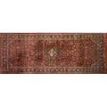 Persian oriental rug roomsized with blue center medallion and all over floral design on red ground 20th c 234 x 112