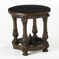 Carved center hall table walnut with carved column legs and stretcher base 19th c 25 12 x 24 12 dia