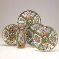 Rose medallion grouping five items 19th c vase with applied foo dogs and dragons 3 9 12 plates and 1 8 14 plate vase 10