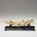 Japanese carved ivory foo dogs elephant tusk carved with three foo dog figures 20th c 13 12 x 2 12 x 2