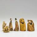 Asian ivory carvings six 20th c pair of figural snuff bottles two figures of sleeping gentlemen and two okimono tallest 4 14