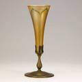 Tiffany pulled feather vase within a floriform bronze base early 20th c missing one petal marked 12