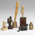 Carved figure grouping ten in various subjects and media 18th20th c tallest 7