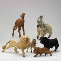 Fur covered toy animals six early 20th c two lions zebra camel goat and bull tallest 12