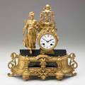 French figural mantle clock gilt metal and black marble 19th c 14 12 x 13 12 x 5 14