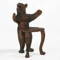 Black forest bear chair carved wood with painted detail and glass eyes 20th c 34 x 21 x 19