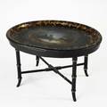 Papier mache tray table tray with handpainted snow scene and gilded holly leaf decoration 19th c later stretcher base 19 12 x 31 x 24 12