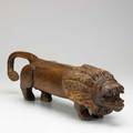Folk art carved lion painted detail 20th c 7 x 23