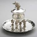 Tiffany  co rabbit acrobats silver inkwell 1882 bulbous incised inkwell supported by four rabbits standing on forepaws on lotusshaped tray with bunny paw feet a fifth rabbit performing a heads