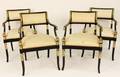 Four Regency Style Ebonized  Gilt Wood Chairs