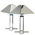 C jereartisan housepair of table lamps los angeles 1977chromed steel each with two socketssigned and datedoverall 27 x 17 14 sq