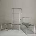 Modernfour pieces etagere coffee table and two sofa tables usa 1970schrome brass smoked glass and glassunmarkedetagere 73 x 30 x 14