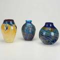 Charles lottonthree glass vessels in cobalt and golden yellow including lava vase 1974signed and datedlargest 7 12