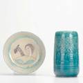 Henry street settlementtwo vessels vase in teal with incised peacock decoration signed comtois and low bowl in crackle glaze with figure signed esc new york 1920sboth markedvase 7 34 x 4