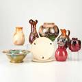 Zuidholland goudanine pieces two unique metalique vases muvlee bowl and pitcher deco bulbous vase unicum vase pitcher is raspberry glaze and two plates by leendert muller gouda netherlands 1